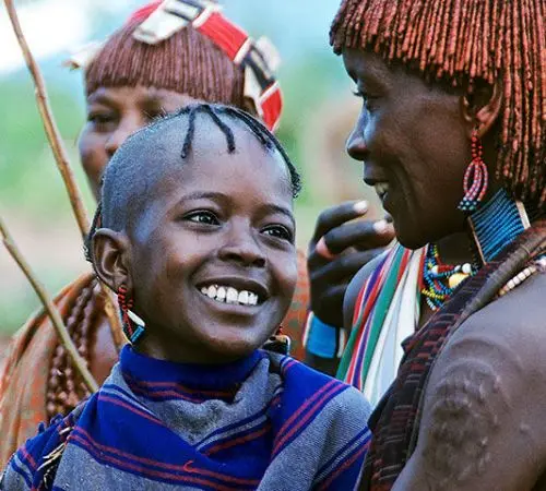 African child and woman smiling