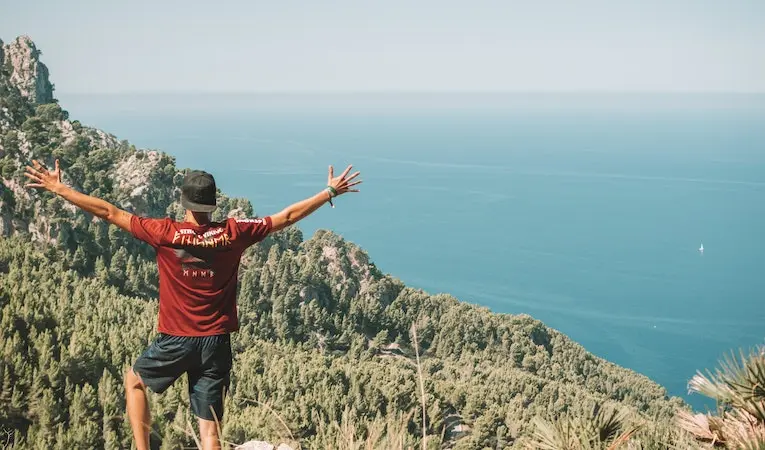 person overlooking ocean in spain