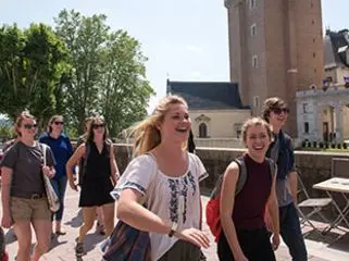 USAC students walking along the streets of France.