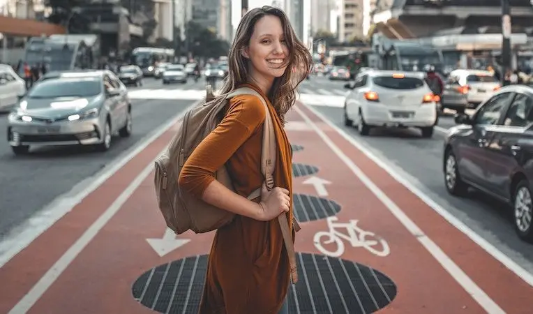 Girl standing in middle of street