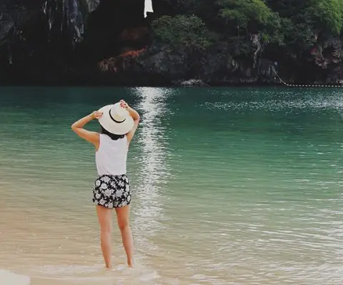 girl standing in water in thailand