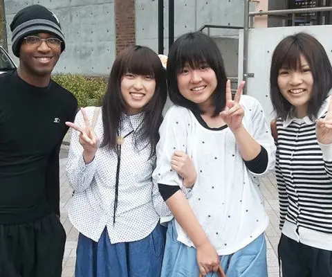 Students doing the peace sign