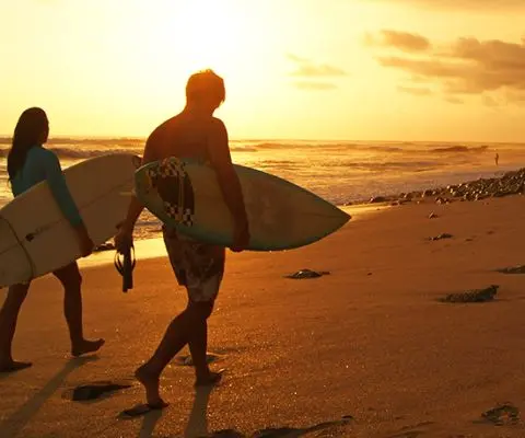 Surfers on Santa Teresa beach