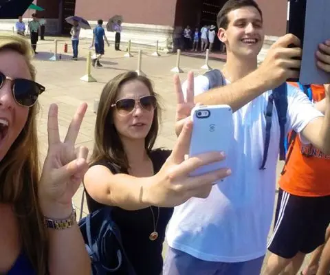 Students taking photos with their phones