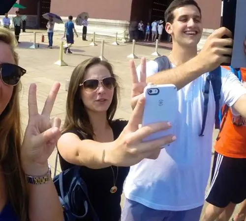 Students taking photos with their phones