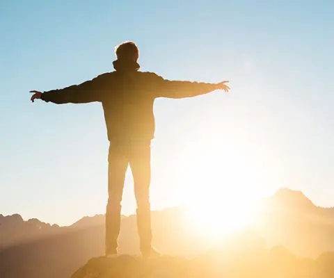 Mt. Cook, New Zealand, standing in the sunlight