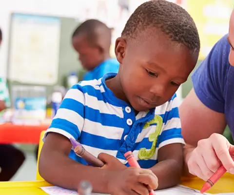 Teacher coloring with students