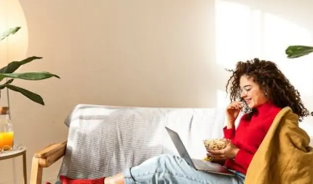 student enjoying her Amber living space